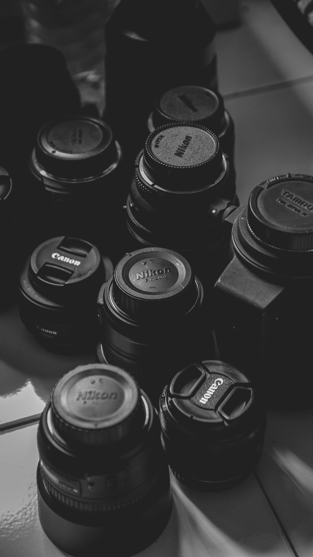 Close-up of a camera lens for choosing shots