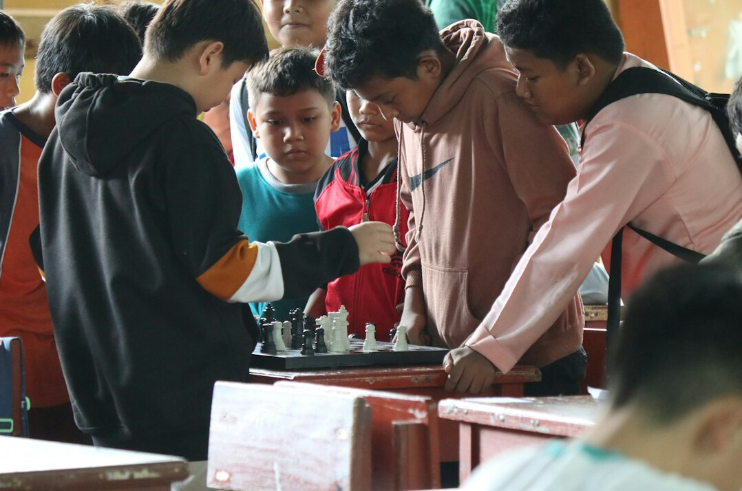 Group of trainees working together around a table